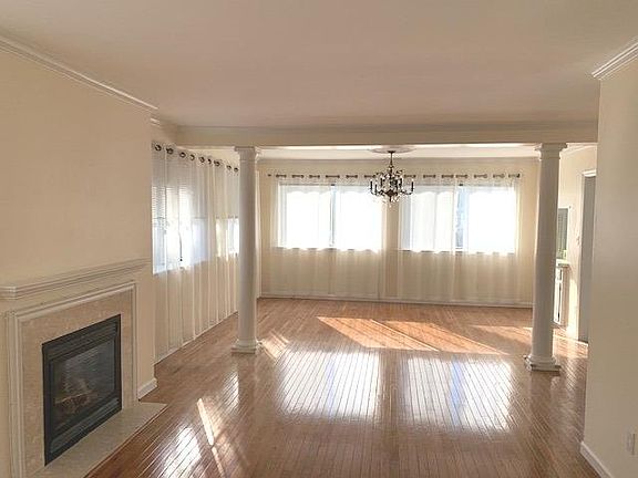 Living Room to Dining Room w/Walled Windows