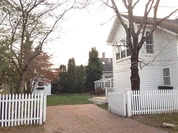 Driveway & Fenced Yard with Shared Shed