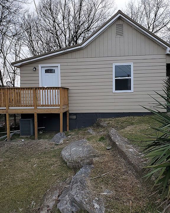 New door and wrap around deck