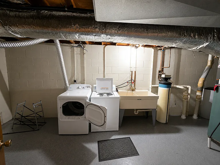 In unit laundry hookup available, utility sink, and storage