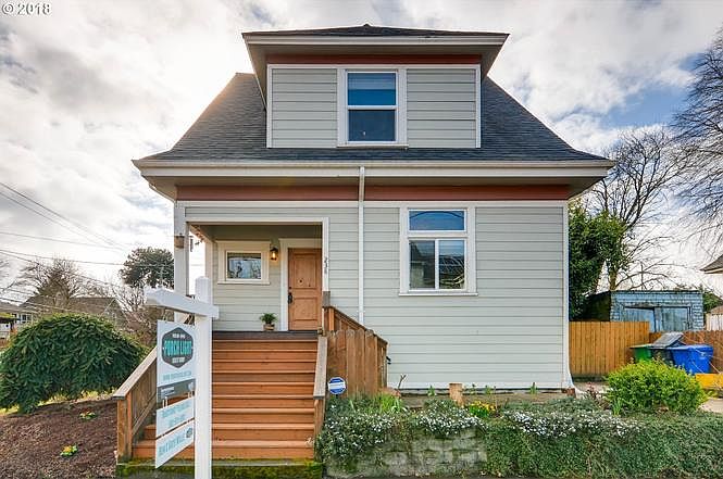 Front of house with one off-street parking spot
