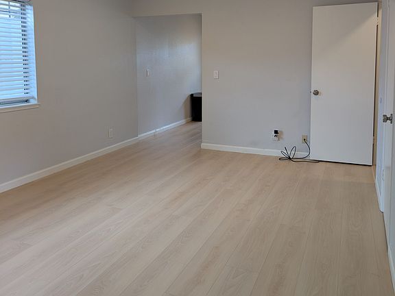 Living room with a half bathroom
