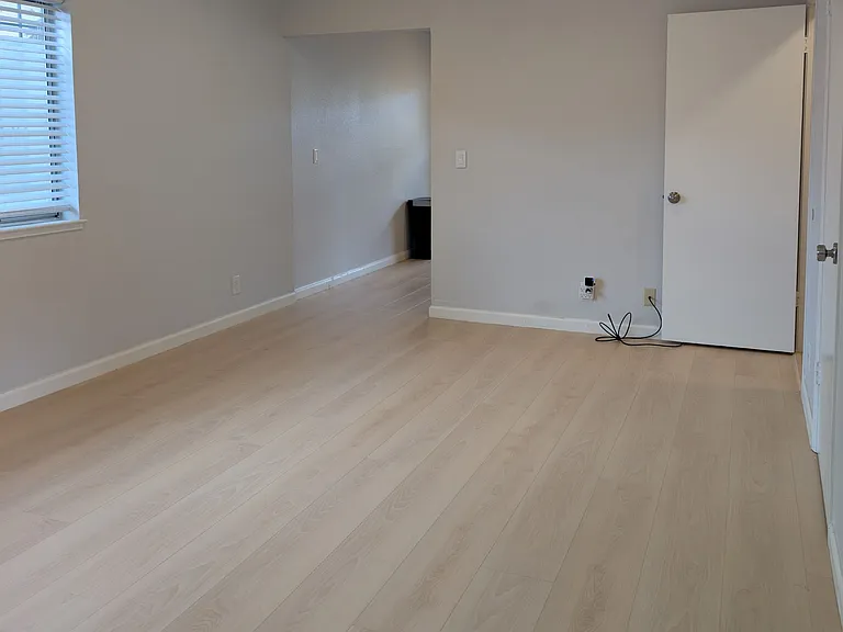 Living room with a half bathroom