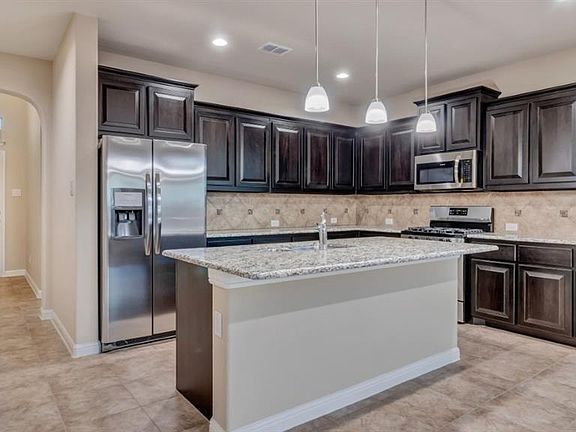 Photos shown here may not depict the specified home & features included are for illustration purposes only