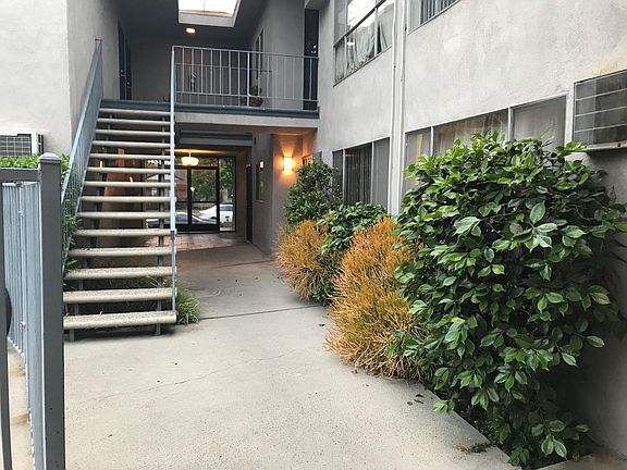 CONDO-LIKE PRIVATE PROPERTY! Set Back from Street~ Recessed glass Entry Doors, Quiet & Immaculate Courtyard Building.