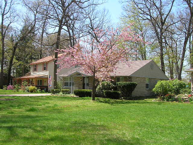 Brick home. Attached garage. Fenced in yard. lovely neighborhood.