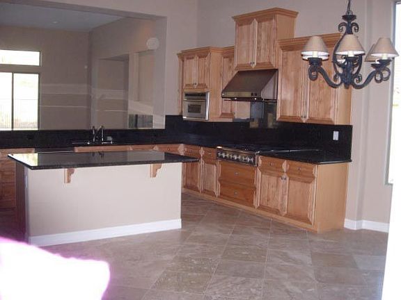 Gourmet upgraded kitchen with 2 ovens, warming drawer, gas cook top, a chefs d