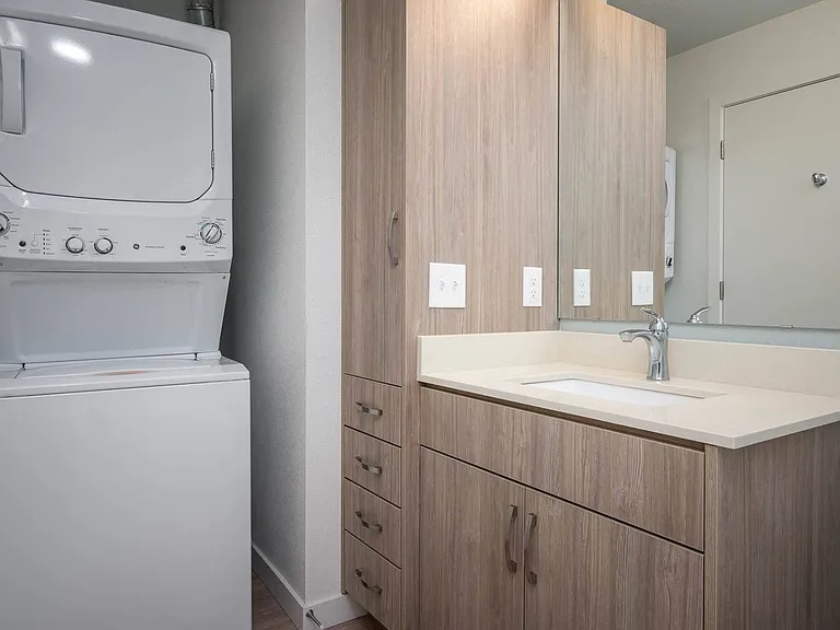 The Byway | #201 Large Primary Bathroom with Wood Cabinetry, Stackable Washer and Dryer