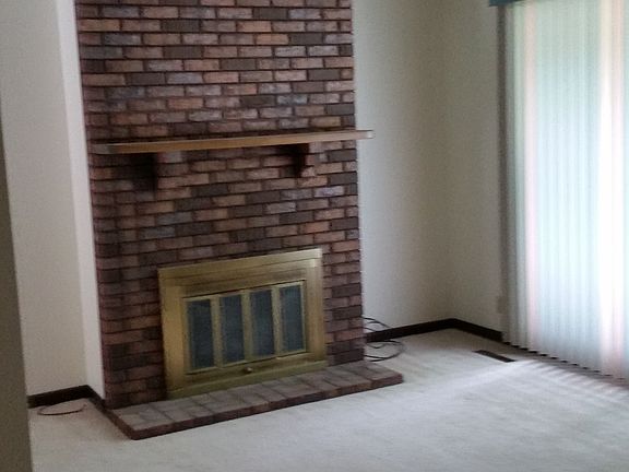 gas fireplace in vaulted living room