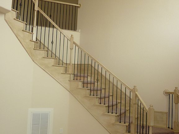Curved staircase by entry