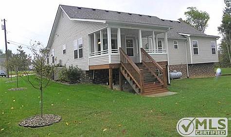 Nice back yard with covered deck.