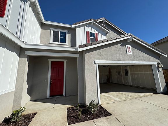 Main entrance and garage