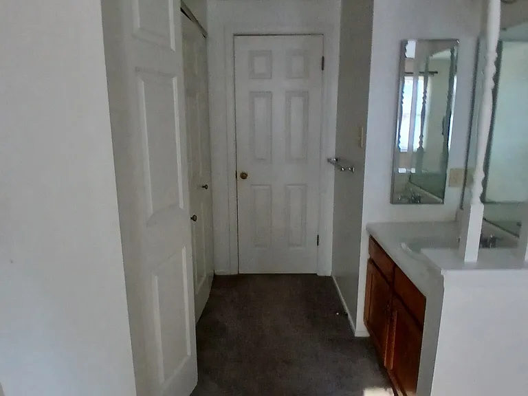 View of extra vanity in master bedroom.