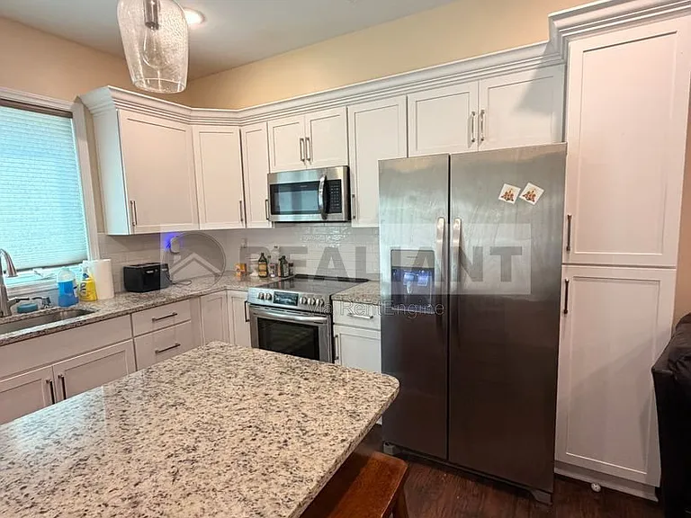 438 Kenton St — Photo 19