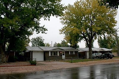Pleasant street with fenced yard