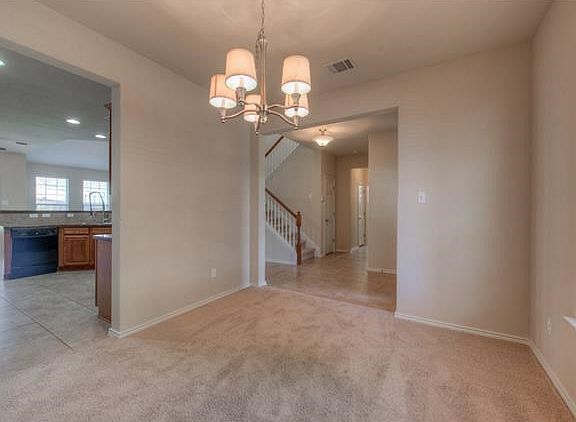 Formal dining is convenient to guests coming in and the kitchen!