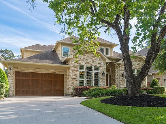 DID NOT FLOOD! ZONED TO OAK FOREST ELEMENTARY!  Beautiful two-story home with master down, four spacious bedrooms, with three and a half baths, chef's dream kitchen, with butler's pantry, wet bar, formal dining, spacious study, and exceptionally large cov