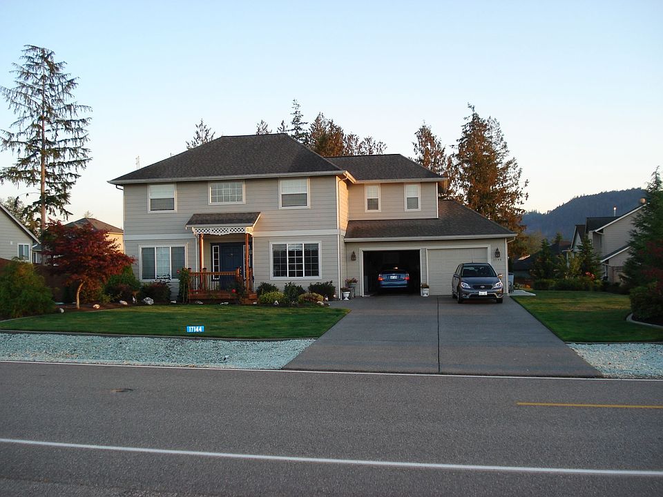 ALMOST 1/3 ACRE HS W/TWO CAR GARAGE