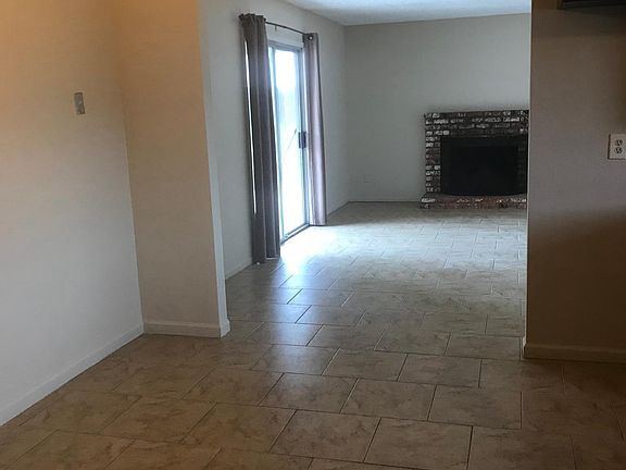 Large area fir dining room table adjacent to Family room. 