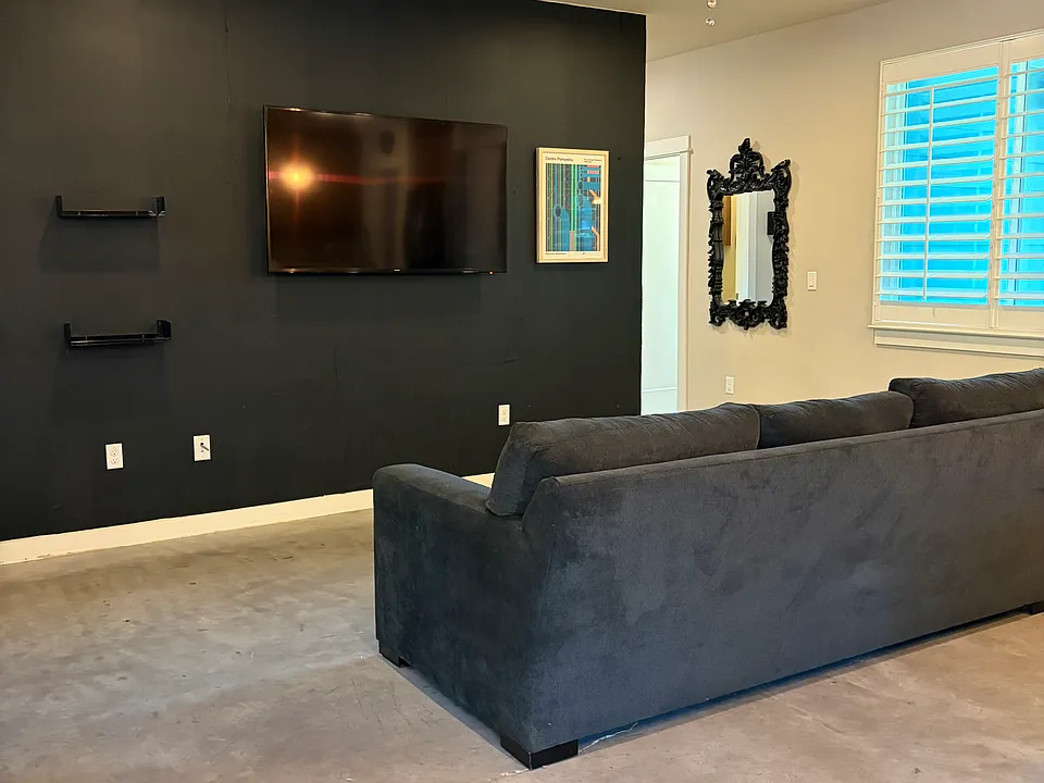 Open concept living room, can remove or keep furniture.