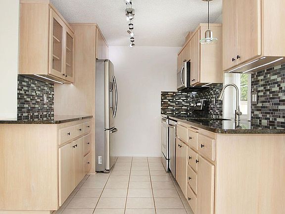 Nice lighting with a big window and overheads, newer applian