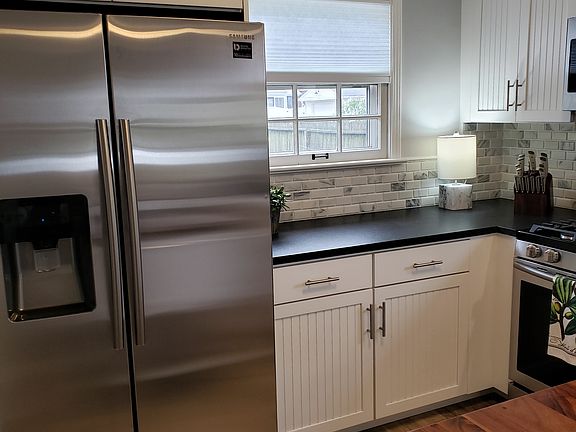 Beadboard accents in kitchen