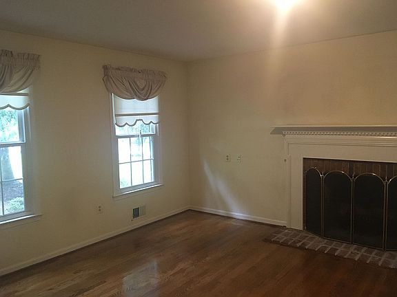 Office w 4 window, fireplace