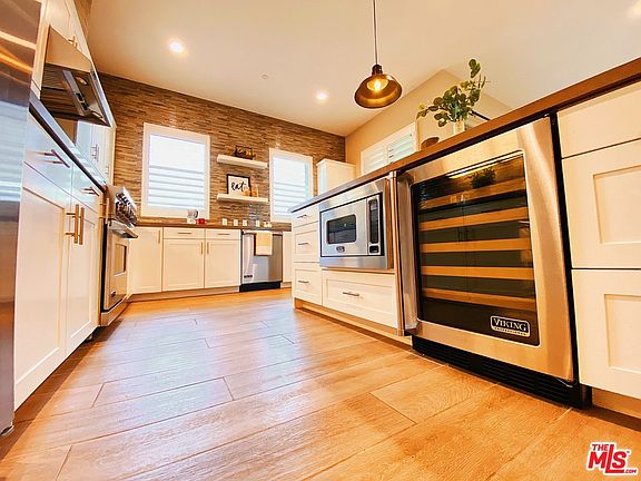 5th image of 5837 S Village Dr #1