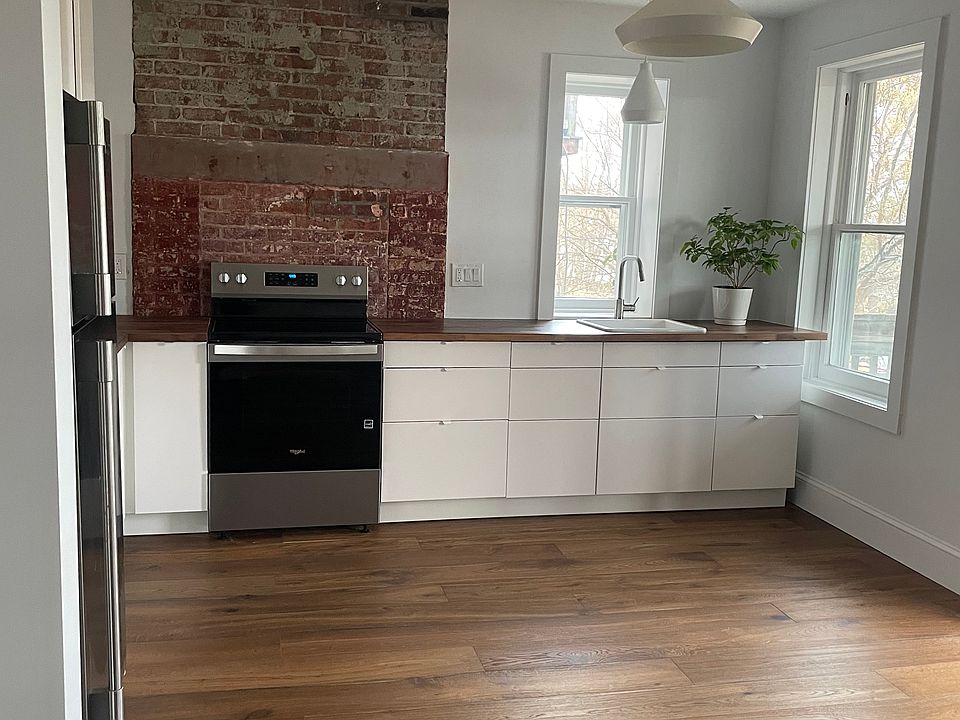 Original, exposed brick chimney