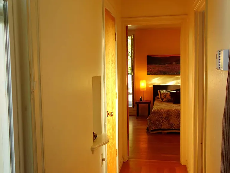hallway to bathroom, closets and master bedroom