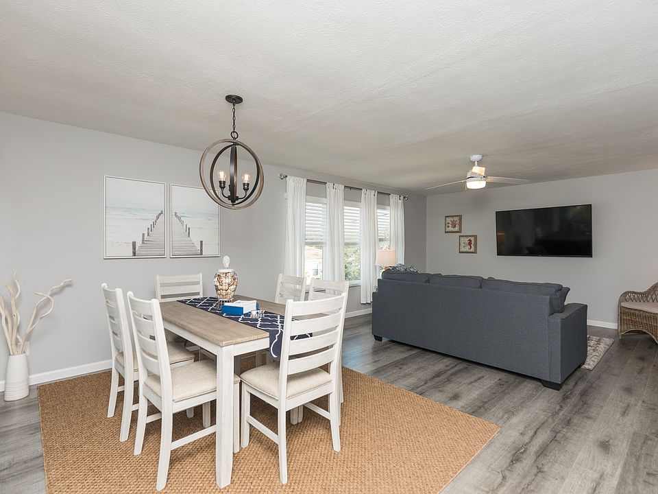 Enter and see dining to the left and living area straight ahead.