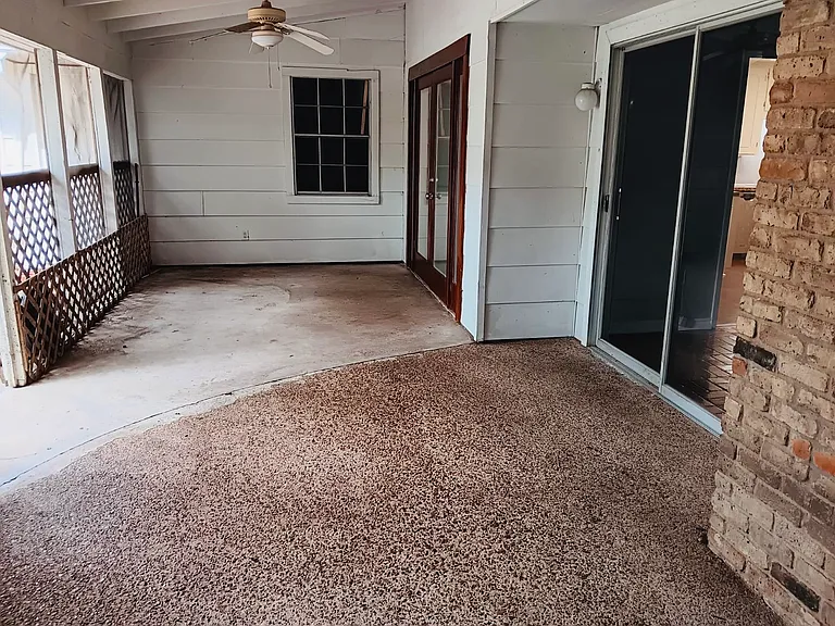 Covered and screened in back porch