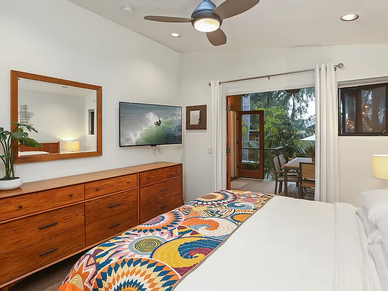 Master Bedroom looking out to the covered Patio and backyard