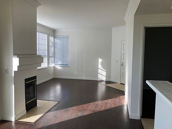 Family room & Living room-picture taken from the kitchen. The door is the front entrance