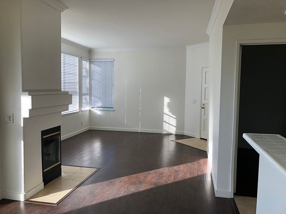 Family room & Living room-picture taken from the kitchen. The door is the front entrance