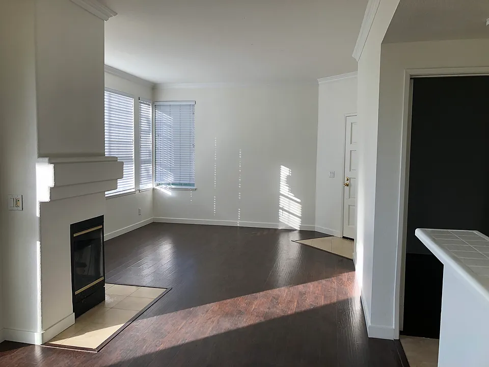 Family room & Living room-picture taken from the kitchen. The door is the front entrance