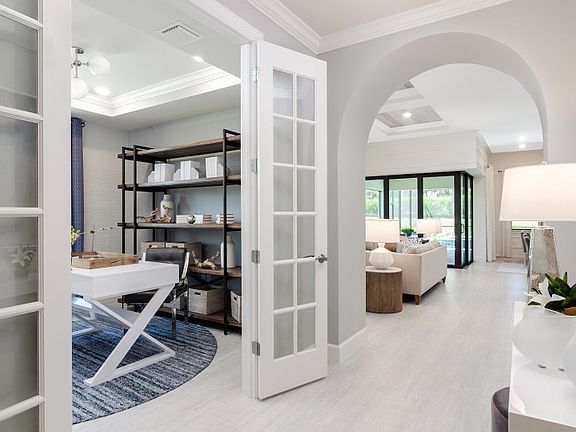 Model Representation Bright and welcoming foyer in a popular open floor plan