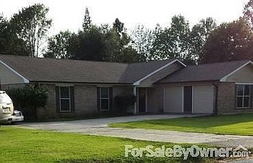 2923 Flora RD.
						:
						Vinyl Siding added in 2009 along with gutters.