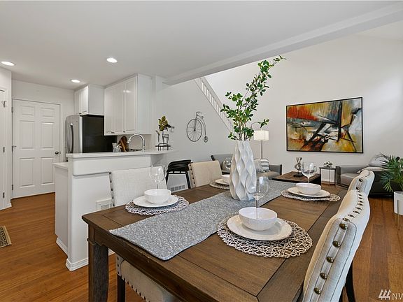 Open living, dining and kitchen.