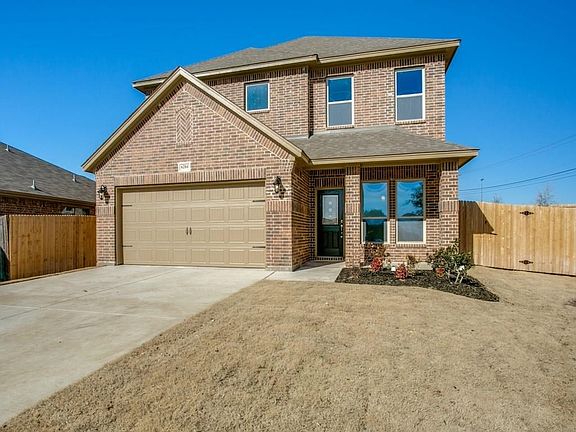 Covered front porch welcomes you to 6204 Spring Buck Run.