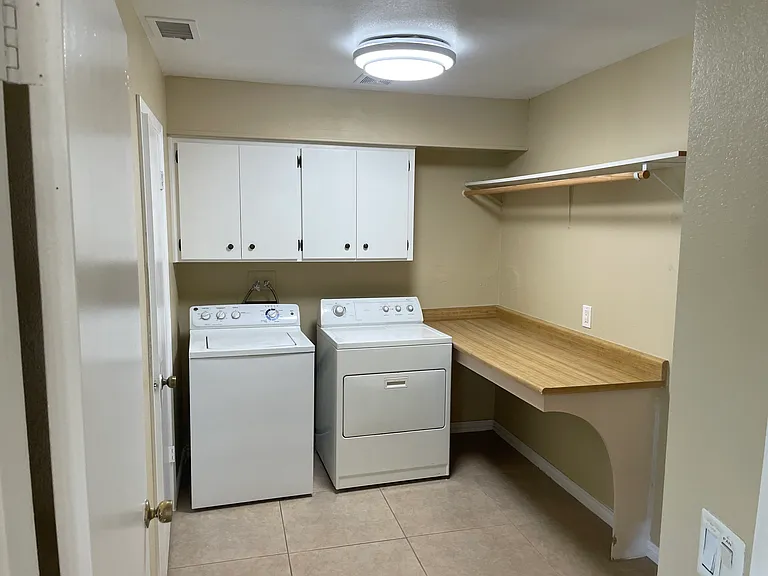 Large Laundry Room with oversized washer & Dryer