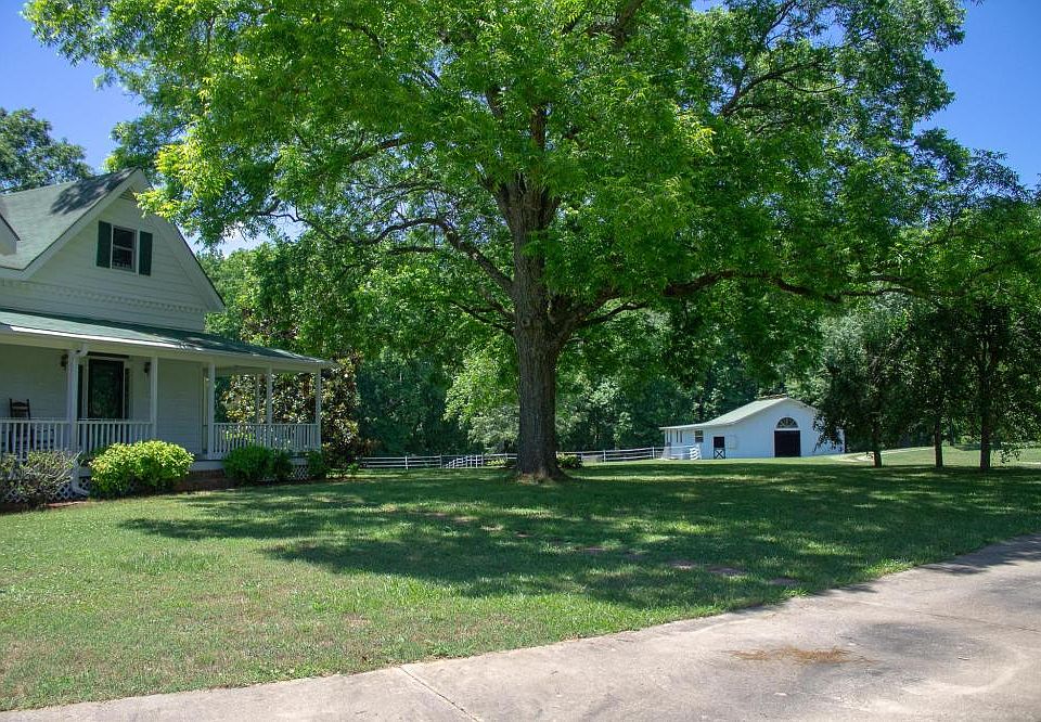 View from the driveway - house and barn