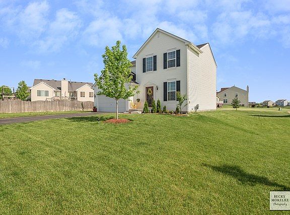 Premium lot with pond view & access to walking trails.