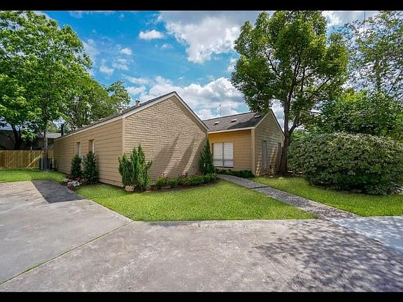 The front of the house faces the side street off of Peppermi