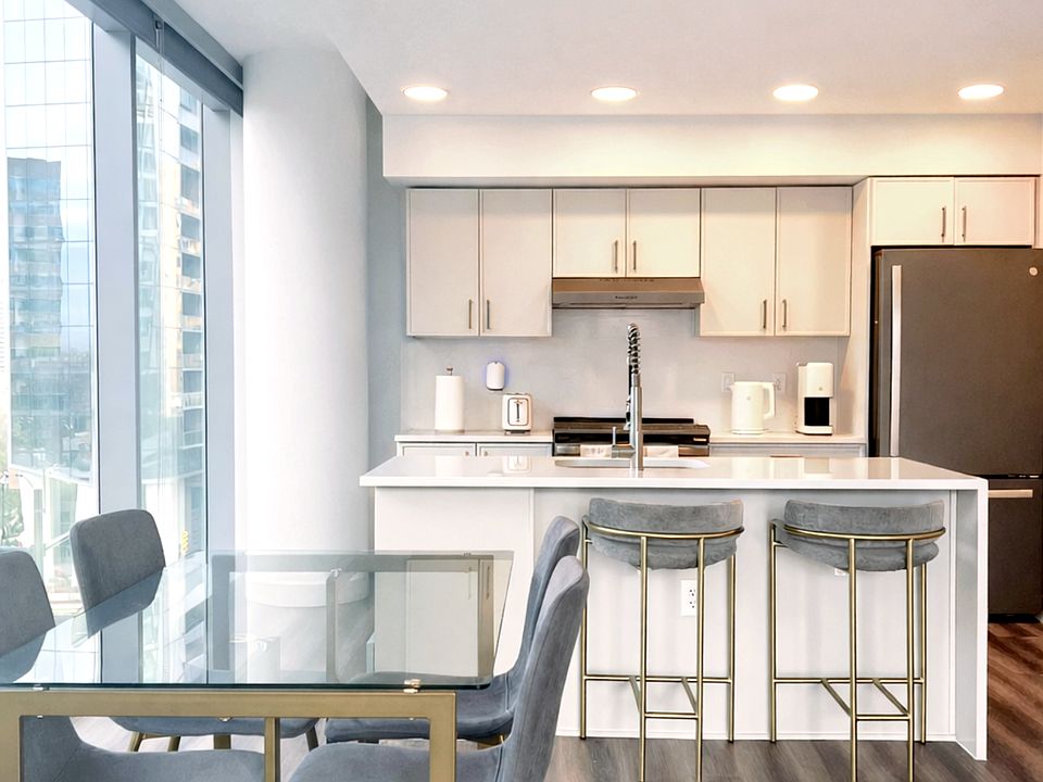 Home-like layout with floor-to-ceiling windows that showcase luxury city views, giving you a front-row seat to a neighborhood that buzzes with energy by day and feels calm and quiet at night.