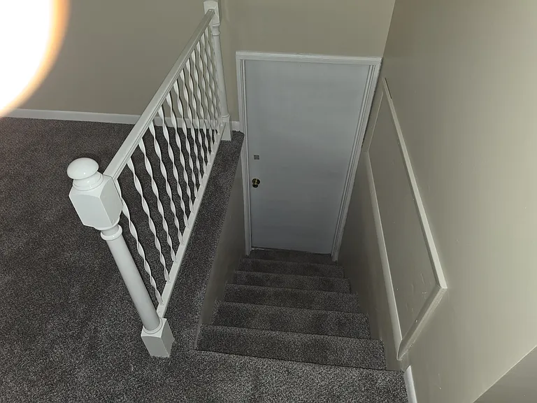 Steps to garage and laundry