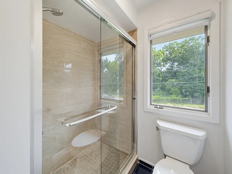 HALLWAY BATHROOM-SEPERATED SHOWER AND TOILET ROOM