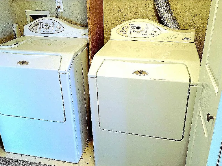 Closeted Enclosed with High Efficiency Front Loading Washer and Dryer