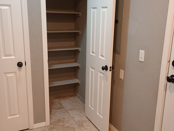 Pantry/Storage in Laundry room.