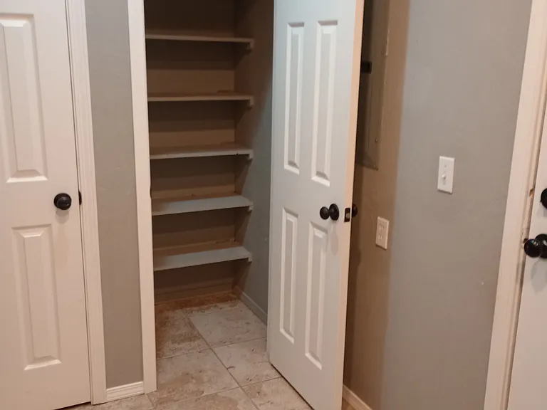 Pantry/Storage in Laundry room.